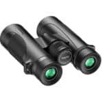 • Apexel 10x42 High Quality Binoculars APS-RB10X42W is a professional-grade optical binocular designed for outdoor enthusiasts, travelers, wildlife observers, and sports spectators who require clear, detailed long-distance viewing. Featuring powerful 10x magnification, premium BAK4 roof prism optics, and fully multi-coated lenses, these binoculars deliver bright, sharp images with excellent contrast and color accuracy. Built with a durable aluminum alloy frame and protective rubber armor, the binoculars provide reliable performance in outdoor environments while maintaining a comfortable and ergonomic grip. • 10× Powerful Magnification allows users to observe distant objects with impressive clarity, making it ideal for bird watching, hiking, hunting, camping, sports events, and nature exploration. • 42mm Large Objective Lens gathers more light for brighter and clearer images, even in low-light environments such as dawn, dusk, or cloudy conditions. • BAK4 Premium Roof Prism System ensures superior optical performance with improved brightness, sharpness, and high contrast image quality. • Fully Multi-Coated Optical Lenses enhance light transmission while reducing reflections and glare, delivering vibrant and accurate color reproduction. • Wide Field of View (102m/1000m) provides a broader viewing area, allowing users to easily track moving subjects such as birds, animals, or sports action. • 3m Close Focus Distance enables detailed observation of nearby subjects, perfect for nature enthusiasts studying plants, insects, or small wildlife. • Twist-Up Eyecups Design offers comfortable viewing for both eyeglass wearers and non-eyeglass users by adjusting the eye relief easily. • Center Focus Adjustment System allows smooth and precise focusing with a simple turn of the central focus wheel. • Durable Aluminum Alloy Frame with Rubber Armor provides strong structural protection while ensuring a non-slip and comfortable grip during extended use. • Water-Resistant Outdoor Design helps protect internal optical components from moisture and light rain, making it suitable for outdoor adventures. Specifications Product Name: Apexel 10x42 Waterproof Binoculars Model: APL-RB10X42W Magnification: • 10× Objective Lens Diameter: • 42 mm Eyepiece Diameter: • 21 mm Prism System: • Roof Prism • BAK4 Prism Glass Lens Coating: • Fully Multi-Coated Field of View: • 102 m / 1000 m Close Focus Distance: • 3 meters Exit Pupil Diameter: • 4.2 mm Exit Pupil Distance: • 14 mm Focus System: • Center Focus Eye Cup Type: • Twist-Up Eyecups Material: • Aluminum Alloy Frame • Rubber Protective Sheath • Optical Glass Lenses Color: • Black Dimensions: • 160 × 128 × 53 mm Functions: • Long-distance observation • Wide field outdoor viewing • Precision optical focusing • Comfortable ergonomic grip • Low-light enhanced viewing • Suitable for travel, wildlife, sports, and outdoor exploration