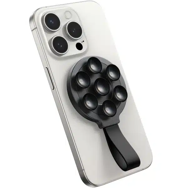 • JOYROOM JR-ZS393 Magnetic Suction Phone Mount is a compact and highly versatile phone holder designed for secure mounting and hands-free usage. Built with powerful N52 magnets and a strong suction cup base, this mount ensures a firm grip on both your device and surfaces. Whether for content creation, video calls, or everyday convenience, it offers reliable stability and portability in a sleek, user-friendly design. • Powerful Magnetic Suction Technology features built-in N52 strong magnets that provide instant attachment and a secure hold, keeping your phone firmly in place even during movement. • Stable Suction Cup Base ensures strong adhesion to smooth surfaces such as glass, tiles, mirrors, or desks, preventing slipping or wobbling during use. • Wide Compatibility supports smartphones ranging from 4.7 to 7.0 inches, including iPhone 12/13/14/15 series with MagSafe support. For non-MagSafe devices, a metal ring can be used for compatibility. • Hands-Free Shooting Solution is perfect for content creators, vloggers, and live streamers, allowing stable phone positioning for recording videos or taking photos without holding the device. • Portable & Compact Design makes it easy to carry in your pocket, bag, or travel kit, ensuring convenience wherever you go. • Durable Build Quality constructed with high-quality ABS, PC, and silicone materials for long-lasting performance and reliability. • Silicone Strap Design adds extra convenience, allowing you to hang, carry, or store the mount easily when not in use. Specifications Product Name: JOYROOM JR-ZS393 Magnetic Suction Phone Mount Model: • JR-ZS393 Material: • ABS + PC + Silicone Magnetic Type: • N52 Strong Magnets Mounting Type: • Suction Cup + Magnetic Attachment Compatible Phone Size: • 4.7 – 7.0 inches Compatibility: • iPhone 12 / 13 / 14 / 15 series (MagSafe supported) • Other smartphones with metal ring attachment Design Features: • Compact and lightweight • Silicone strap for easy carrying • Stable suction base Functions: • Magnetic phone mounting • Hands-free video recording • Live streaming support • Portable usage Usage Scenarios: • Content creation • Video calls • Desk setup • Travel and outdoor use
