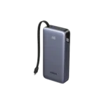 • UGREEN PB536 (55988B) Nexode Power Bank 20000mAh 45W with Built-in Cable is a premium high-capacity fast charging power bank designed for professionals, travelers, and everyday users who need reliable portable power. Featuring up to 45W USB-C fast charging, a built-in braided USB-C cable, and multi-device charging support, this compact power bank keeps smartphones, tablets, and accessories powered throughout the day. With a smart LED battery display and durable premium construction, it delivers convenience, speed, and long-lasting performance wherever you go. • 45W USB-C Fast Charging Output delivers rapid charging for smartphones, tablets, and compatible laptops, making it ideal for modern high-power devices. • Built-in Braided USB-C Cable provides convenient cable-free charging and recharging, eliminating the need to carry extra accessories. • Dual-Purpose Integrated Cable supports both input and output charging, allowing the power bank itself to recharge through the same built-in cable. • 3 Outputs for Simultaneous Charging includes built-in USB-C cable, USB-C port, and USB-A port to power up to three devices at once. • 20000mAh High-Capacity Battery provides multiple recharges for phones and extended backup power for tablets or accessories. • Smart LED Battery Display shows real-time remaining battery percentage for accurate power management. • 8.6-inch (22cm) Cable Length offers practical reach for charging while holding your phone or keeping devices nearby. • Braided Cable with Carry Loop Design resists tangling and wear while also functioning as a convenient carrying strap. • Wide Device Compatibility supports iPhone, Samsung Galaxy, iPad, earbuds, smartwatches, and many USB-powered devices. • Premium Fire-Resistant Build made from durable PC + Aluminum Alloy for better durability and heat resistance. Specifications Product Name: UGREEN PB536 (55988B) Nexode Power Bank 20000mAh 45W with Built-in Cable Brand: • UGREEN Model / SKU: • PB536 / 55988B Battery Capacity: • 20000mAh (Typical) Maximum Output Power: • Up to 45W Charging Ports / Outputs: • Built-in USB-C Cable • 1 × USB-C Port • 1 × USB-A Port Total Outputs: • Charge up to 3 devices simultaneously Input: • 5V–20V ⎓ 3.25A (Max) Built-in Cable Length: • 8.6 inches / 22 cm Display: • LED Battery Indicator Material: • Fire-resistant PC + Aluminum Alloy Features: • 45W fast charging • Built-in braided USB-C cable • Charge & recharge via same cable • 3-device simultaneous charging • 20000mAh large capacity • LED battery percentage display • Portable carry loop cable design • Wide device compatibility