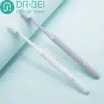 Dr. Bei Bass Toothbrush Youth Edition This is the Xiaomi eco-chain product, therefore there is no Xiaomi logo on it! Thank you for your understanding. Colours available: White, Grey Main Features: 1. Made with TORAY ultra-fine bristles. 2. 0.01mm bristle tips 3. Uses premium nickel-silver for tufting. Therefore, it is more corrosion resistant and harder for bacteria to grow and multiply. 4. Ergonomic and comfortable 5. Flexible and elastic brush neck to avoid accidental injuries. Recommended Brushing Method The key to preventing and controlling gum disease is brushing thoroughly around and under the gumline where bacteria and plaque tend to accumulate. This technique is good for those with periodontitis. In the Bass method of brushing, the toothbrush bristles reach under the gums to scrub off plaque before it hardens into tartar and causes gum disease: Place the toothbrush parallel to your teeth with the bristles toward the gums. Tilt the brush to a 45-degree angle and move the bristles slightly under the gumline. With firm but gentle pressure, and while maintaining the bristles under the gum tissue, wiggle or vibrate the brush back and forth or use a small circular motion 15 to 20 times, before moving to the next area. The brush should cover two to three teeth at a time. Brush the entire outer surface of the teeth and then continue the same technique on the tongue side. To brush the insides of the front teeth, hold the toothbrush in a vertical position and use the bristles on the toe of the brush, but make sure they are getting under the gum tissue. Brush the chewing surface of the molar teeth and don’t forget your tongue. Product Specifications: Product name: DR.BEI Bass Toothbrush, 3 Pieces (Youth) Product model: DR.BEI Bass Toothbrush, Youth Package Dimensions: Size (L x B x H): 6 x 2 x 23cm Weight: 0.04kg Quantity: 1pc