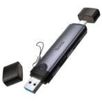 Hoco HB56 Victory USB/Type-C 3-in-1 Card Reader 1. Material: Aluminum Alloy 2. Dimensions: 95.6 x 20.7 x 10.5 mm 3. Weight: 19g 4. Interface: USB-A, Type-C to SD cards, TF 3.0 cards, and USB 2.0 5. Theoretical Transmission Speed: USB 2.0: 480 Mbps; SD and TF 3.0 cards: 5 Gbps 6. Supports memory cards with a maximum capacity of up to 2TB. 7. Plug and play, no driver installation required, easy to use. 8. Supports universal connectivity via both USB-A and USB-C interfaces, enabling high-speed data reading; offers broad compatibility and is suitable for use with a wide range of devices.
