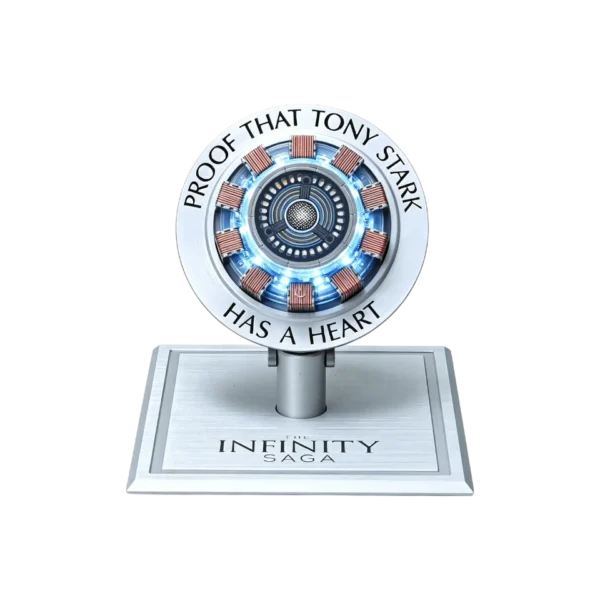 • **Marvel Iron Man Arc Reactor Wireless Charger** is a premium collectible-inspired wireless charging station designed to bring the iconic Arc Reactor from Iron Man to life while providing fast and efficient wireless charging. Crafted from CNC aluminum alloy with detailed movie-inspired aesthetics, this charger combines advanced 15W wireless fast charging technology, intelligent temperature control, magnetic charging functionality, immersive sound effects, and LED ambient lighting. Perfect for Marvel fans, collectors, and tech enthusiasts, it serves as both a functional charging accessory and a stunning desktop display piece. • **Authentic Arc Reactor Design** recreates the legendary Iron Man Arc Reactor with intricate detailing, making it an eye-catching centerpiece for any desk, gaming setup, or display collection. • **15W PD Wireless Fast Charging** supports high-speed wireless charging with compatibility for 15W, 10W, 7.5W, and 5W charging modes for a wide range of devices. • **Magnetic Charging Functionality** provides secure device alignment for efficient and stable wireless charging performance. • **Automatic Sensing & Lifting Mechanism** intelligently detects compatible devices and enhances the charging experience with dynamic operation. • **"Proof Tony Stark Has a Heart" Engraved Alloy Frame** features iconic English engraving on a premium CNC-machined metal outer frame, inspired by the Marvel universe. • **Premium CNC Aluminum Alloy Construction** delivers excellent durability, premium aesthetics, and a sophisticated metallic finish. • **Anodized Metal Wire-Drawing Process** enhances the appearance of the base bracket while improving scratch resistance and long-term durability. • **Exclusive Arc Reactor Sound Effects** activate when powered on, with immersive startup audio and double-click pulse energy sound effects for a cinematic experience. • **Intelligent Temperature Control System** monitors charging temperatures to help maintain safe and efficient charging performance. • **Embedded LED Ambient Lighting** recreates the glowing Arc Reactor effect and enhances the visual atmosphere of any workspace or gaming setup. • **5mm Charging Induction Distance** allows efficient wireless charging through most standard phone cases without removing them. • **Luxury Gift Box Packaging** makes it an excellent premium gift for Marvel fans, collectors, and technology enthusiasts. --- **Specifications** **Product Name:** Marvel Iron Man Arc Reactor Wireless Charger **Charging Type:** • Wireless Fast Charging **Input Power:** • 5V/2A • 9V/2A **Maximum Output Power:** • 15W Max **Wireless Charging Compatibility:** • 15W • 10W • 7.5W • 5W **Wireless Charging Induction Distance:** • Up to 5mm **Wireless Charging Coil Module Size:** • 59.5mm **Materials:** • CNC Aluminum Alloy • PC • ABS • Electronic Components **Product Dimensions:** • 164 × 164 × 154 mm **Package Dimensions:** • 205 × 205 × 100 mm **Lighting Effects:** • Embedded LED Ambient Lighting **Sound Effects:** • Power-On Exclusive Sound Effect • Double-Click Pulse Energy Sound Effect **Special Features:** • Arc Reactor-inspired design • Magnetic charging support • Automatic sensing technology • Intelligent lifting mechanism • Intelligent temperature control • CNC alloy engraved outer frame • Premium anodized finish • Display and collectible functionality **Package Type:** • Premium Gift Box Packaging --- **Q&A** **Q1: What is the maximum charging speed supported by the Arc Reactor Charger?** A1: It supports up to 15W wireless fast charging for compatible devices. **Q2: Does it support magnetic charging?** A2: Yes, it features magnetic charging functionality for secure device alignment and charging efficiency. **Q3: Can it charge phones through a case?** A3: Yes, the charger supports a wireless induction distance of up to 5mm, allowing charging through most standard phone cases. **Q4: Does it include LED lighting effects?** A4: Yes, it features built-in LED ambient lighting designed to replicate the iconic Arc Reactor glow. **Q5: Are there sound effects included?** A5: Yes, the charger plays exclusive startup sounds and pulse energy sound effects for an immersive experience. **Q6: What materials are used in its construction?** A6: It is made from premium CNC aluminum alloy, PC, ABS, and high-quality electronic components. **Q7: Is this charger suitable as a display piece?** A7: Yes, its movie-inspired Arc Reactor design makes it an excellent collectible and decorative desktop centerpiece. **Q8: Does it have temperature protection?** A8: Yes, it includes intelligent temperature control technology for safer charging performance. **Q9: Which charging power levels are supported?** A9: The charger supports 15W, 10W, 7.5W, and 5W wireless charging modes. **Q10: Is it a good gift for Marvel fans?** A10: Absolutely. The premium construction, iconic design, LED effects, sound features, and luxury packaging make it an excellent gift for Marvel and Iron Man enthusiasts.