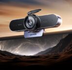 • **UGREEN CM797 (45644) 2K Mini Webcam** is a compact and professional webcam designed for video conferencing, online classes, live streaming, remote work, and everyday video calls. Equipped with a 4MP image sensor and 2K 30fps video output, the webcam delivers sharp, detailed, and vibrant visuals for a more professional communication experience. Featuring dual omnidirectional microphones, built-in high-fidelity speakers, a privacy cover, and a durable metal base, the CM797 offers excellent audio and video performance while maintaining user privacy and convenience. • **2K High-Definition Video Resolution** delivers clear and detailed video output at 2K 30fps for professional-quality video calls and online meetings. • **4MP Image Sensor** captures high-quality images with improved clarity and realistic color reproduction. • **Fixed Focus Lens** provides stable and consistent image quality without the need for manual focus adjustments. • **Dual Omnidirectional Microphones** capture sound from multiple directions, ensuring natural and clear voice pickup during conversations. • **360° Sound Capture** helps improve communication quality by accurately picking up voices from around the workspace. • **Built-In High-Fidelity Speakers** provide clear and balanced audio output for video calls, virtual meetings, and online communication. • **Integrated Audio Solution** combines microphone and speaker functionality in a single compact device for added convenience. • **Privacy Cover Protection** allows users to physically block the camera lens when not in use for enhanced security and privacy. • **Durable Metal Base Design** offers improved stability and long-lasting durability for desktop placement. • **Plug-and-Play Connectivity** enables quick setup without requiring additional drivers or software installation. • **Wide System Compatibility** works seamlessly with Windows, macOS, and Linux operating systems. • **Ideal for Professional and Personal Use** suitable for online learning, remote work, streaming, virtual meetings, and video chats. --- ## **Specifications** ### **Product Name:** UGREEN CM797 2K Mini Webcam ### **Model:** • CM797 ### **SKU:** • 45644 --- ## **Camera Specifications** ### **Image Sensor:** • 4 Megapixels ### **Video Resolution:** • 2K @ 30fps ### **Focus Type:** • Fixed Focus ### **Image Quality Features:** • High-Definition Video Output • Stable Image Performance • Detailed Visual Reproduction --- ## **Audio Specifications** ### **Microphone Configuration:** • Dual Microphones ### **Microphone Type:** • Omnidirectional Pickup ### **Audio Features:** • 360° Sound Capture • Clear Voice Communication • Natural Audio Reproduction ### **Speaker Type:** • Built-In High-Fidelity Speakers ### **Speaker Features:** • Clear Audio Output • Enhanced Call Experience • Integrated Sound Solution --- ## **Design & Build** ### **Privacy Features:** • Built-In Privacy Cover ### **Base Material:** • Metal Base ### **Construction Benefits:** • Enhanced Stability • Durable Design • Long-Term Reliability --- ## **Connectivity** ### **Connection Type:** • USB ### **Cable Length:** • 1.5m USB Cable ### **Installation:** • Plug-and-Play ### **Driver Requirement:** • No Additional Driver Required --- ## **Compatibility** ### **Windows Support:** • Windows 7 • Windows 8 • Windows 10 • Windows 11 • Later Versions ### **macOS Support:** • Mac OS 10.6 and Above ### **Linux Support:** • Linux Operating Systems ### **Suitable Applications:** • Video Conferencing • Online Classes • Live Streaming • Video Calls • Remote Work • Virtual Meetings --- ## **Features** • 2K 30fps Video Output • 4MP Camera Sensor • Fixed Focus Lens • Dual Omnidirectional Microphones • 360° Audio Pickup • Built-In High-Fidelity Speakers • Privacy Cover • Metal Base Construction • Plug-and-Play Setup • USB Connectivity • Windows, macOS & Linux Support • Compact Desktop Design --- ## **Q&A** ### **Q1: What video resolution does the UGREEN CM797 support?** • The webcam supports 2K video output at 30 frames per second for clear and detailed video quality. ### **Q2: Does the webcam have autofocus?** • No, the CM797 uses a fixed-focus lens designed to provide stable and consistent image quality. ### **Q3: How many microphones are built into the webcam?** • The webcam features dual omnidirectional microphones for enhanced voice pickup. ### **Q4: Does it include built-in speakers?** • Yes, the CM797 comes with integrated high-fidelity speakers for clear audio output. ### **Q5: Does the webcam support privacy protection?** • Yes, it includes a built-in privacy cover that can block the camera lens when not in use. ### **Q6: Is the webcam compatible with Windows 11?** • Yes, it supports Windows 7, 8, 10, 11, and later versions. ### **Q7: Can I use it with Mac and Linux systems?** • Yes, it is compatible with Mac OS 10.6 and above, as well as Linux operating systems. ### **Q8: Does it require software installation?** • No, the webcam supports plug-and-play operation and does not require additional drivers. ### **Q9: What is the cable length of the webcam?** • The webcam includes a 1.5-meter USB cable for convenient connectivity. ### **Q10: What is the primary use of the UGREEN CM797?** • It is ideal for video conferencing, remote work, online learning, live streaming, virtual meetings, and everyday video communication.