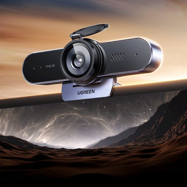 • **UGREEN CM797 (45644) 2K Mini Webcam** is a compact and professional webcam designed for video conferencing, online classes, live streaming, remote work, and everyday video calls. Equipped with a 4MP image sensor and 2K 30fps video output, the webcam delivers sharp, detailed, and vibrant visuals for a more professional communication experience. Featuring dual omnidirectional microphones, built-in high-fidelity speakers, a privacy cover, and a durable metal base, the CM797 offers excellent audio and video performance while maintaining user privacy and convenience. • **2K High-Definition Video Resolution** delivers clear and detailed video output at 2K 30fps for professional-quality video calls and online meetings. • **4MP Image Sensor** captures high-quality images with improved clarity and realistic color reproduction. • **Fixed Focus Lens** provides stable and consistent image quality without the need for manual focus adjustments. • **Dual Omnidirectional Microphones** capture sound from multiple directions, ensuring natural and clear voice pickup during conversations. • **360° Sound Capture** helps improve communication quality by accurately picking up voices from around the workspace. • **Built-In High-Fidelity Speakers** provide clear and balanced audio output for video calls, virtual meetings, and online communication. • **Integrated Audio Solution** combines microphone and speaker functionality in a single compact device for added convenience. • **Privacy Cover Protection** allows users to physically block the camera lens when not in use for enhanced security and privacy. • **Durable Metal Base Design** offers improved stability and long-lasting durability for desktop placement. • **Plug-and-Play Connectivity** enables quick setup without requiring additional drivers or software installation. • **Wide System Compatibility** works seamlessly with Windows, macOS, and Linux operating systems. • **Ideal for Professional and Personal Use** suitable for online learning, remote work, streaming, virtual meetings, and video chats. --- ## **Specifications** ### **Product Name:** UGREEN CM797 2K Mini Webcam ### **Model:** • CM797 ### **SKU:** • 45644 --- ## **Camera Specifications** ### **Image Sensor:** • 4 Megapixels ### **Video Resolution:** • 2K @ 30fps ### **Focus Type:** • Fixed Focus ### **Image Quality Features:** • High-Definition Video Output • Stable Image Performance • Detailed Visual Reproduction --- ## **Audio Specifications** ### **Microphone Configuration:** • Dual Microphones ### **Microphone Type:** • Omnidirectional Pickup ### **Audio Features:** • 360° Sound Capture • Clear Voice Communication • Natural Audio Reproduction ### **Speaker Type:** • Built-In High-Fidelity Speakers ### **Speaker Features:** • Clear Audio Output • Enhanced Call Experience • Integrated Sound Solution --- ## **Design & Build** ### **Privacy Features:** • Built-In Privacy Cover ### **Base Material:** • Metal Base ### **Construction Benefits:** • Enhanced Stability • Durable Design • Long-Term Reliability --- ## **Connectivity** ### **Connection Type:** • USB ### **Cable Length:** • 1.5m USB Cable ### **Installation:** • Plug-and-Play ### **Driver Requirement:** • No Additional Driver Required --- ## **Compatibility** ### **Windows Support:** • Windows 7 • Windows 8 • Windows 10 • Windows 11 • Later Versions ### **macOS Support:** • Mac OS 10.6 and Above ### **Linux Support:** • Linux Operating Systems ### **Suitable Applications:** • Video Conferencing • Online Classes • Live Streaming • Video Calls • Remote Work • Virtual Meetings --- ## **Features** • 2K 30fps Video Output • 4MP Camera Sensor • Fixed Focus Lens • Dual Omnidirectional Microphones • 360° Audio Pickup • Built-In High-Fidelity Speakers • Privacy Cover • Metal Base Construction • Plug-and-Play Setup • USB Connectivity • Windows, macOS & Linux Support • Compact Desktop Design --- ## **Q&A** ### **Q1: What video resolution does the UGREEN CM797 support?** • The webcam supports 2K video output at 30 frames per second for clear and detailed video quality. ### **Q2: Does the webcam have autofocus?** • No, the CM797 uses a fixed-focus lens designed to provide stable and consistent image quality. ### **Q3: How many microphones are built into the webcam?** • The webcam features dual omnidirectional microphones for enhanced voice pickup. ### **Q4: Does it include built-in speakers?** • Yes, the CM797 comes with integrated high-fidelity speakers for clear audio output. ### **Q5: Does the webcam support privacy protection?** • Yes, it includes a built-in privacy cover that can block the camera lens when not in use. ### **Q6: Is the webcam compatible with Windows 11?** • Yes, it supports Windows 7, 8, 10, 11, and later versions. ### **Q7: Can I use it with Mac and Linux systems?** • Yes, it is compatible with Mac OS 10.6 and above, as well as Linux operating systems. ### **Q8: Does it require software installation?** • No, the webcam supports plug-and-play operation and does not require additional drivers. ### **Q9: What is the cable length of the webcam?** • The webcam includes a 1.5-meter USB cable for convenient connectivity. ### **Q10: What is the primary use of the UGREEN CM797?** • It is ideal for video conferencing, remote work, online learning, live streaming, virtual meetings, and everyday video communication.