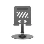 • **WiWU ZM-013 Rotation Stand** is a premium multifunctional desktop stand designed to provide stable, adjustable, and hands-free support for smartphones and tablets up to 12.9 inches. Built with a durable aluminum alloy and iron construction, this versatile stand features an advanced AR damping shaft that enables smooth 360° rotation without dead angles, allowing users to achieve the perfect viewing position for work, entertainment, video calls, online learning, and content creation. The addition of silicone protection pads ensures secure device placement while preventing scratches and slipping. Whether you're watching videos, attending meetings, reading, live streaming, or creating content, the WiWU ZM-013 Rotation Stand delivers a comfortable and professional user experience. • **Premium Aluminum Alloy & Iron Construction** provides exceptional durability, stability, and long-term reliability while maintaining a sleek and modern appearance. • **360° Full Rotation Design** allows unrestricted adjustment for portrait and landscape viewing, making it easy to find the ideal angle for any activity. • **Advanced AR Damping Shaft** ensures smooth movement and stable positioning, allowing precise adjustments without unwanted wobbling. • **Wide Device Compatibility** supports smartphones and tablets up to 12.9 inches, making it suitable for a broad range of devices. • **Silicone Protection Pads** help protect devices from scratches while enhancing grip and preventing accidental slips. • **Stable Anti-Slip Design** keeps the stand securely positioned on desks, tables, and countertops for reliable hands-free use. • **Adjustable Viewing Angles** provide ergonomic positioning that helps reduce neck and shoulder strain during prolonged use. • **Ideal for Video Calls & Online Meetings** keeps devices at a comfortable viewing height for professional communication and virtual learning. • **Perfect for Content Creators** offers stable support for live streaming, video recording, podcasting, social media content, and online presentations. • **Convenient Desktop Organization** keeps smartphones and tablets easily accessible while freeing up valuable workspace. • **Portable & Space-Saving Design** makes it easy to carry between home, office, studio, and travel locations. --- ```markdown id="2l7gew" --- ``` ```markdown id="b92agq" ## Specifications ``` ```markdown id="fc3m39" **Product Name:** WiWU ZM-013 Rotation Stand ``` **Brand:** • WiWU **Model:** • ZM-013 **Product Type:** • Smartphone & Tablet Rotation Stand **Material:** • Aluminum Alloy • Iron • Silicone Protection Pads **Compatibility:** • Smartphones • Tablets • Devices up to 12.9 Inches **Rotation:** • 360° Full Rotation **Adjustment Mechanism:** • AR Damping Shaft **Protection Features:** • Silicone Anti-Scratch Pads • Anti-Slip Support Structure **Design Features:** • Adjustable Viewing Angles • Stable Desktop Placement • Hands-Free Operation • Portable Construction **Applications:** • Video conferencing • Online learning • Live streaming • Content creation • Office work • Reading • Watching videos • Gaming • Digital drawing **Key Features:** • Premium metal construction • Smooth rotation mechanism • Wide compatibility • Ergonomic adjustment • Stable support • Device protection • Modern design ```markdown id="1jyreo" ## Q&A ``` ```markdown id="6919z4" **Q1: What devices can be used with the WiWU ZM-013 Rotation Stand?** A: The stand supports most smartphones and tablets up to 12.9 inches in size. ``` **Q2: What materials are used in the stand?** A: It is constructed from premium aluminum alloy and iron, with silicone protection pads for enhanced device safety. **Q3: Does the stand support 360° rotation?** A: Yes, it features full 360° rotation for flexible viewing from virtually any angle. **Q4: What is the purpose of the AR damping shaft?** A: The AR damping shaft provides smooth, controlled movement and stable positioning when adjusting the stand. **Q5: Can it be used with iPads and Android tablets?** A: Yes, it is compatible with most tablets and smartphones up to 12.9 inches. **Q6: Does the stand prevent devices from slipping?** A: Yes, silicone pads and the anti-slip structure help keep devices securely in place. **Q7: Is it suitable for video calls and online classes?** A: Absolutely. The adjustable design provides comfortable positioning for video conferencing and virtual learning. **Q8: Can content creators use this stand for recording videos?** A: Yes, it offers stable hands-free support for live streaming, content creation, and video production. **Q9: Is the stand portable?** A: Yes, its compact and durable design makes it convenient to carry and use in different locations. **Q10: What are the main advantages of the WiWU ZM-013 Rotation Stand?** A: Its durable metal construction, 360° rotation, AR damping shaft, wide compatibility, anti-slip protection, and ergonomic adjustability make it an excellent accessory for productivity and entertainment.
